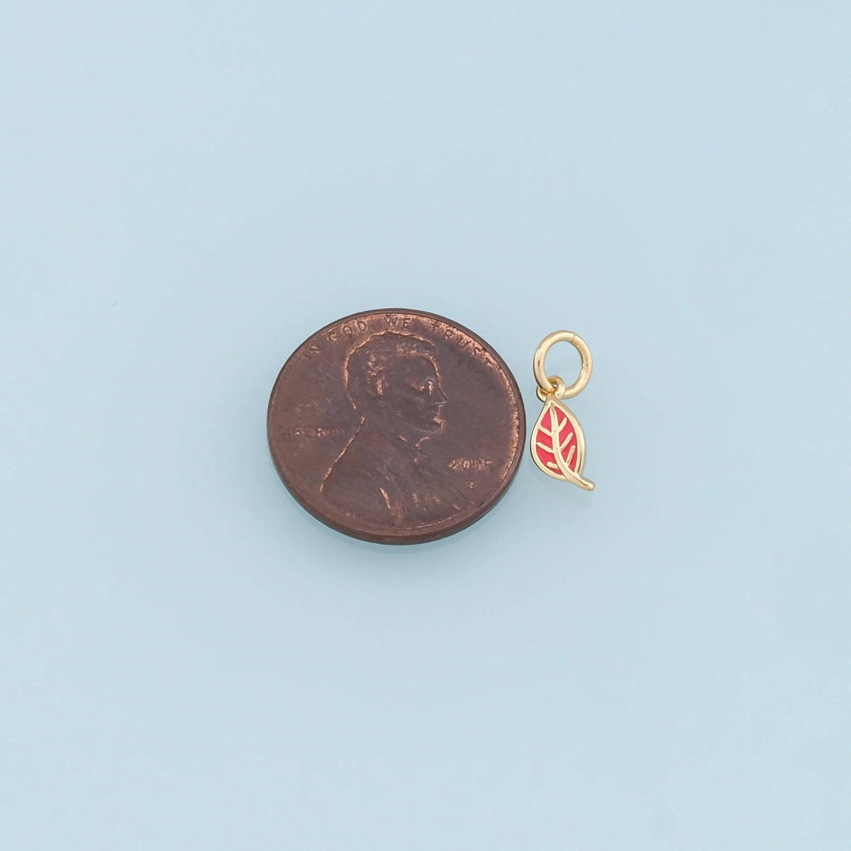 TINY LEAF CHARM